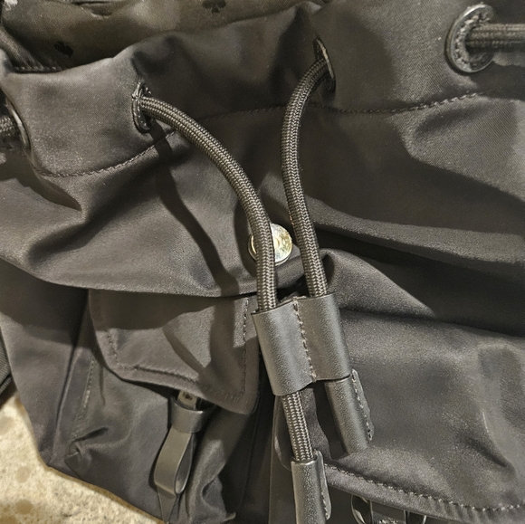 Kate Spade Black Carley Flap Nylon Drawstring Backpack w / Pockets - Picture 4 of 10